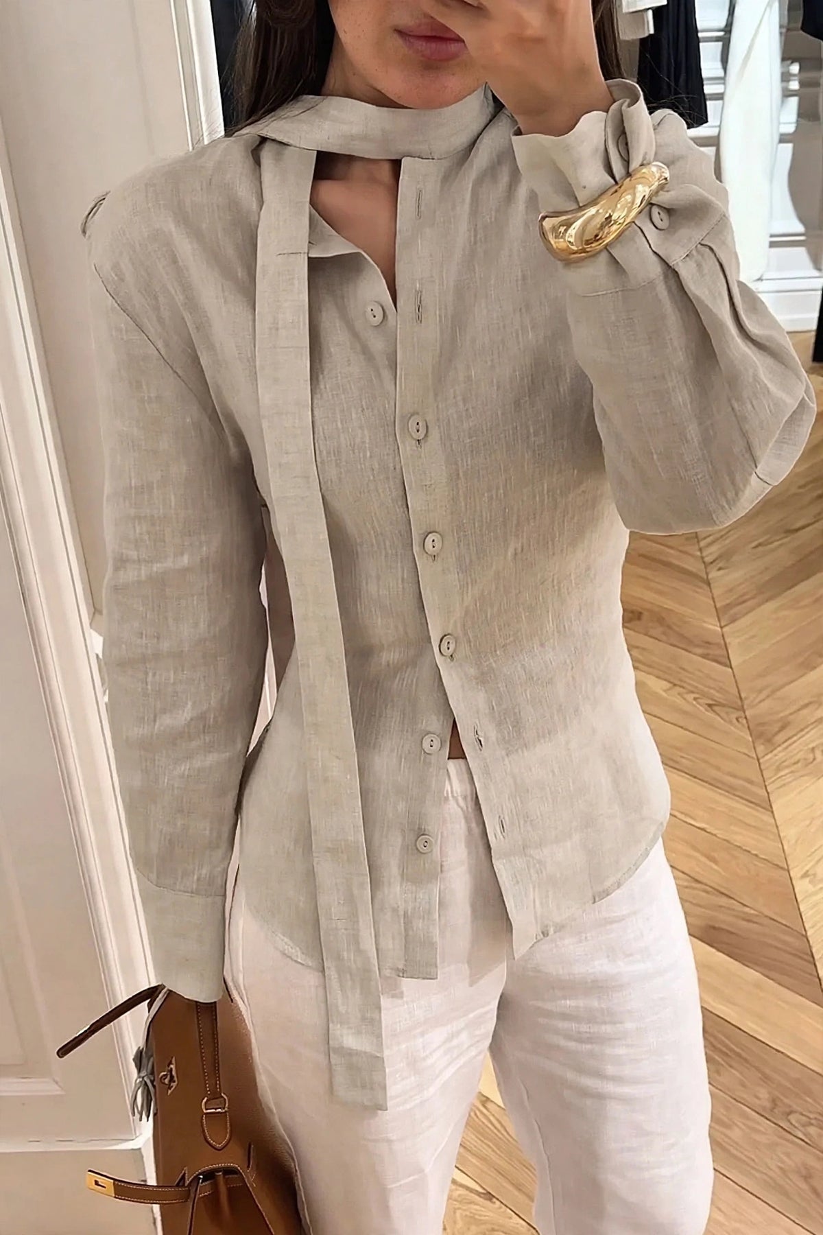 Avoine Beige Linen Tie-Neck Shirt on model