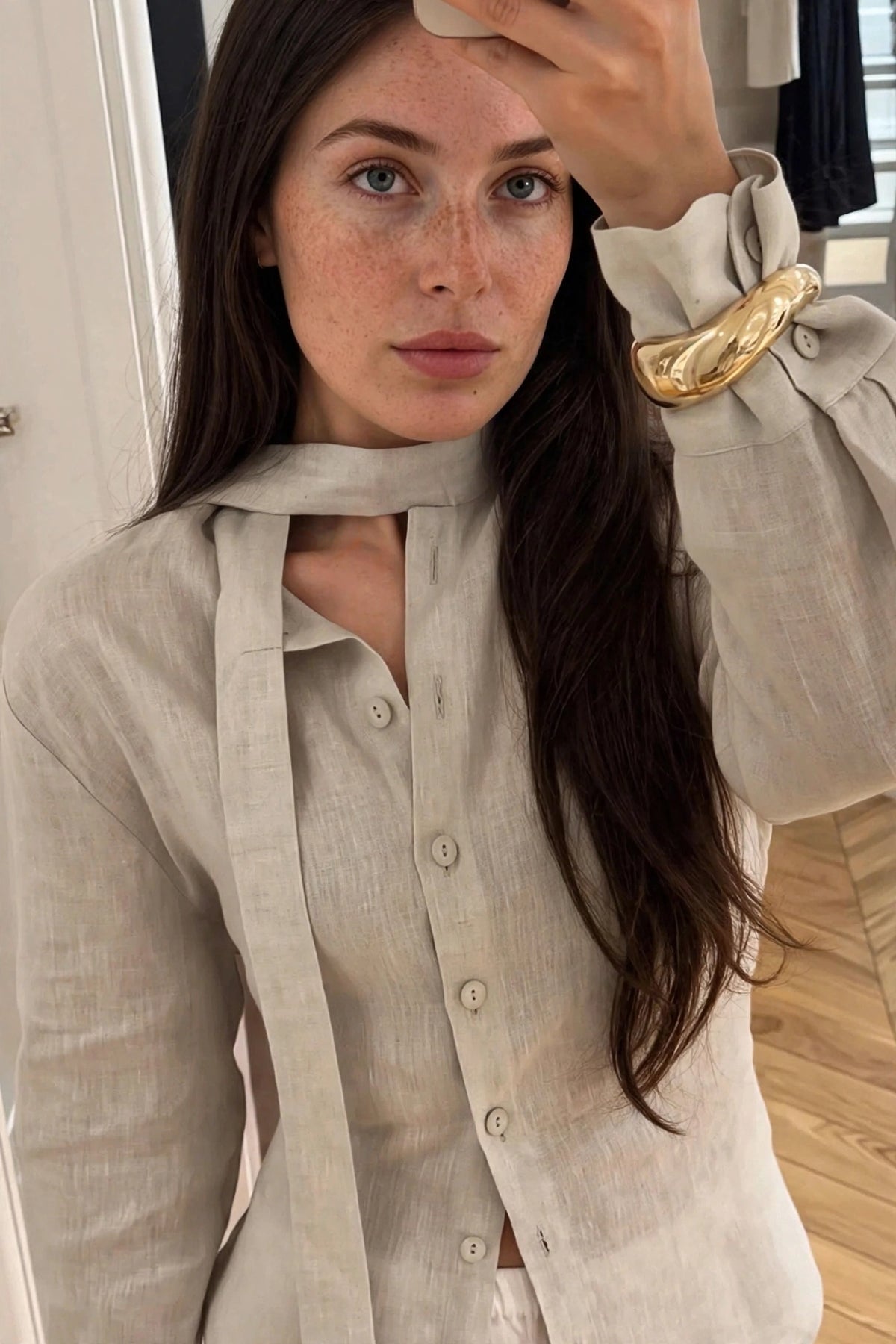 Avoine Beige Linen Tie-Neck Shirt on model