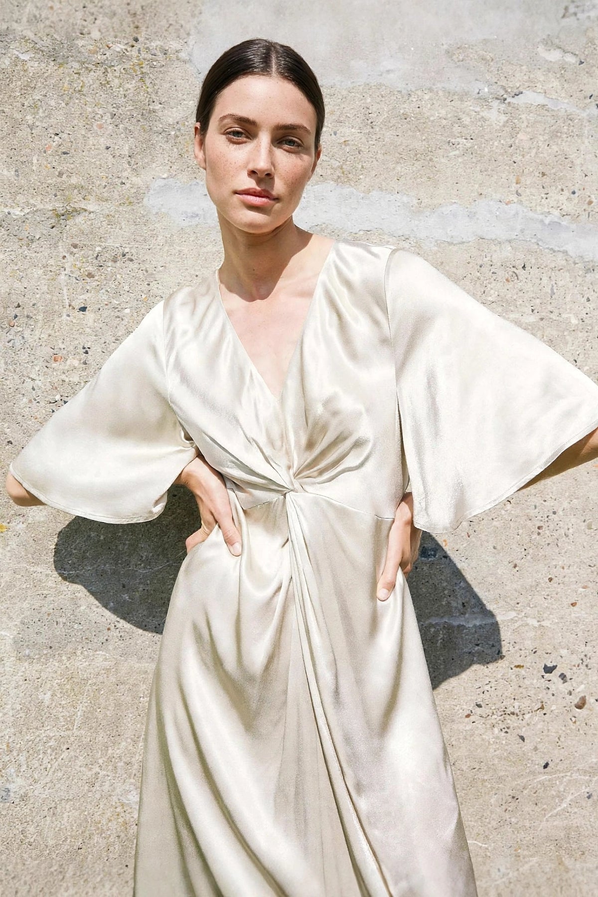 Aurore Champagne Knot Dress on model