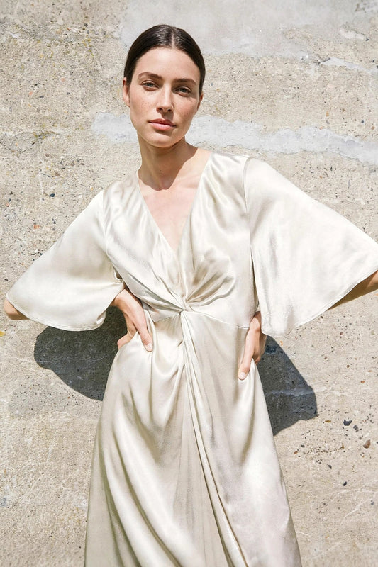 Aurore Champagne Knot Dress on model
