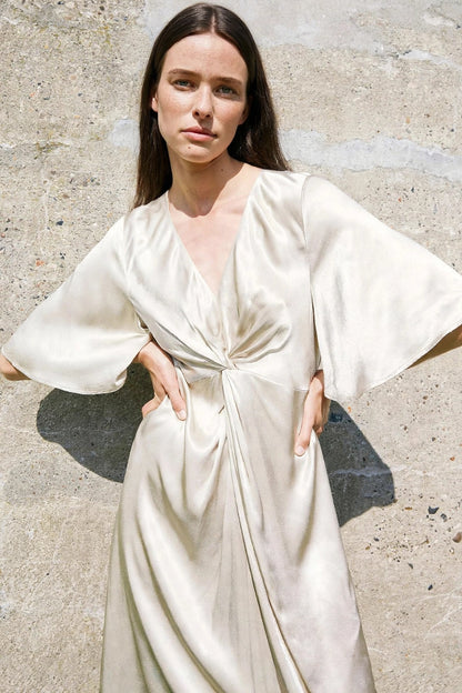 Aurore Champagne Knot Dress on model